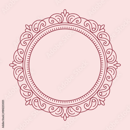 Ornate circular frame with intricate swirls and floral patterns in maroon color