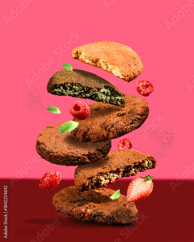 Levitating cookie stack with raspberries, vibrant food styling