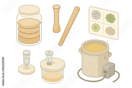 Collection of kitchen utensils and jars, including a jar with a lid, a spoon