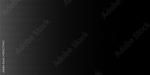 An abstract black and white vector background featuring a gradient created by a pattern of small dots. 