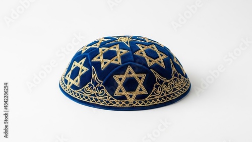 Blue kippah with gold Star of David embroidery on a white background
