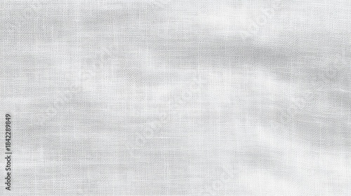 The elegance of linen fabric showcased in its natural state on a white surface.
