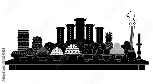 Religious offering table with various fruits and incense sticks.