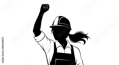 Silhouette of a Determined Female Construction Worker Raising Her Fist.