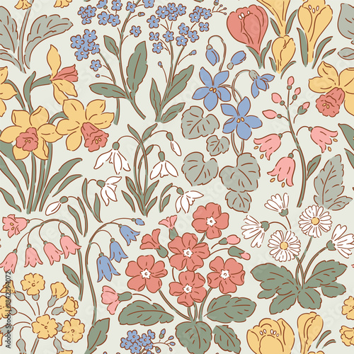 Seamless vector pattern with spring flowers. Hand drawn liberty floral design on isolated background. Snowdrop, crocus, hyacinth, primrose, daffodils, bluebell and violet.