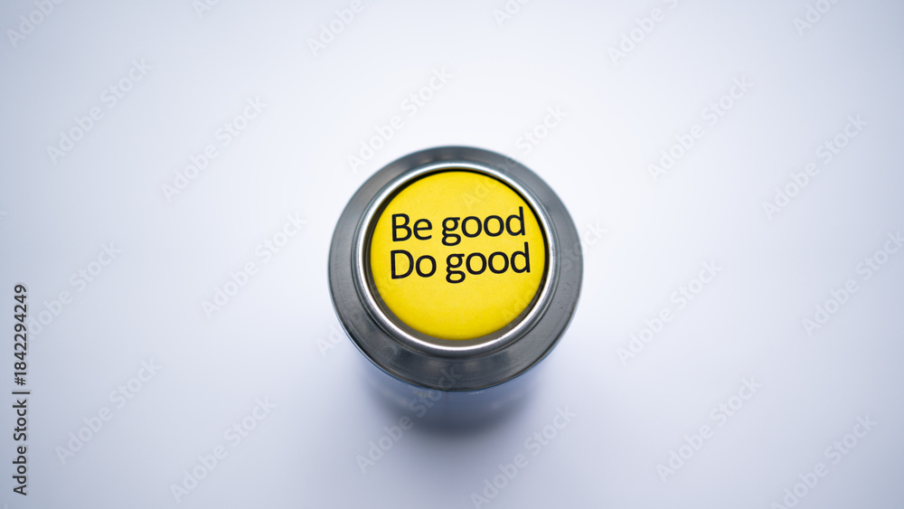 Φωτογραφία Close-up of the yellow pin with inspirational text Be Good Do Good on the dark blue and silver can body