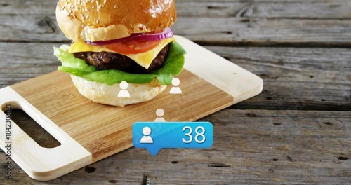 Notification bubble popping confetti, icons rising toward assembling burger, count climbing to 95