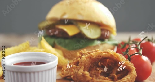 Camera pulling back, cheeseburger and onion ring coming into focus, revealing pickles, for menu