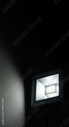 A modern, energy-efficient LED floodlight fixture designed for heavy-duty outdoor use, casting intense, directional illumination across wide spaces ,yard ,spotlight ,projection