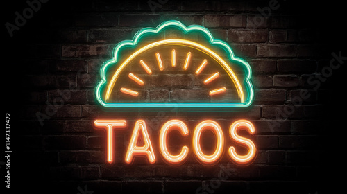 Bright neon taco sign illuminating a brick wall at night