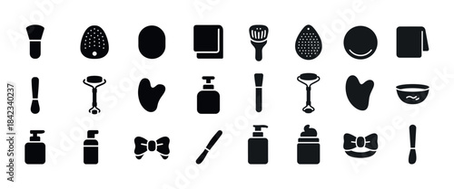 Silhouette icons of cosmetic and spa tools in rows on white back