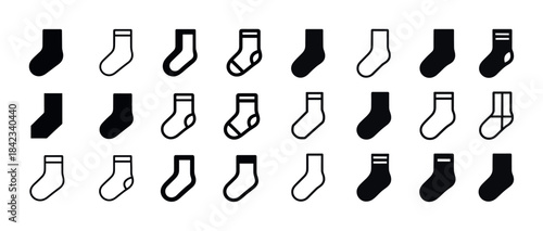 Variety of black and white sock icons in different shapes and st