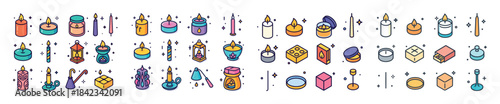Colorful assorted candles in various shapes and sizes with decor