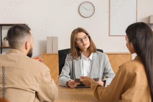Tableau sur toile Female family mediator working with couple in office