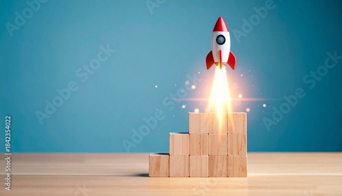 Toy rocket launching from wooden steps on blue background.