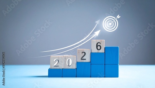 Ascending blue blocks with “2026” cubes and arrows aiming at target.