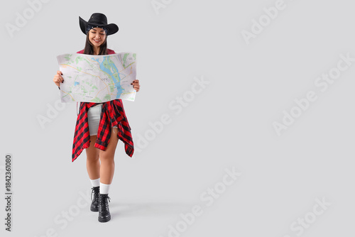 Female guide with map on li...