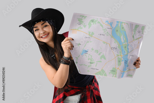 Female guide with map on li...