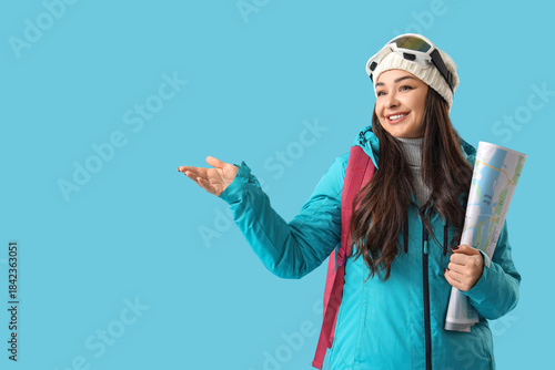Female guide with map showi...
