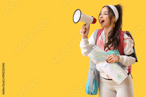 Female guide with map shout...