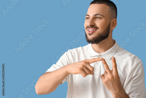 Young man using sign langua...