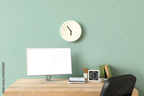 Stylish workspace with alar...