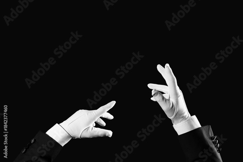 Foto Male magician's hands on black background