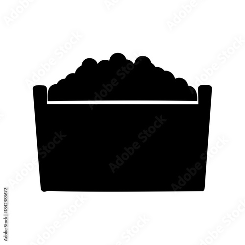 Silhouette of a container full of rounded objects overflowing the brim