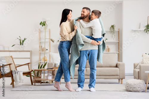 Young woman covering her hu...