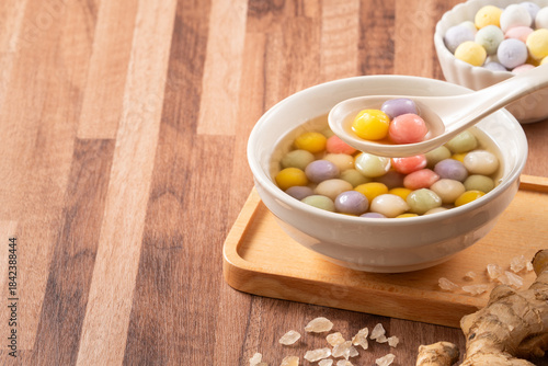 Colorful sweet glutinous rice balls tangyuan in sweet ginger syrup soup