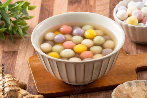 Colorful sweet glutinous rice balls tangyuan in sweet ginger syrup soup