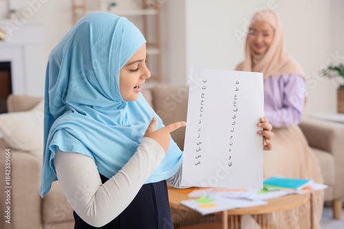 Muslim girl learning Arabic...