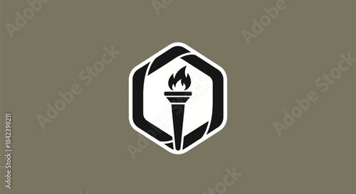 A black and white torch emblem inside a hexagon with a gray background