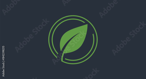 A single green leaf within a double-lined circle, set against a dark blue background