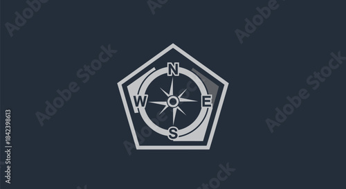 A compass rose with cardinal directions inside a pentagonal frame on a dark blue background