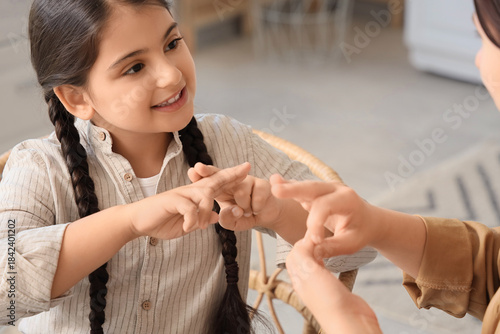 Little girl with her mother...