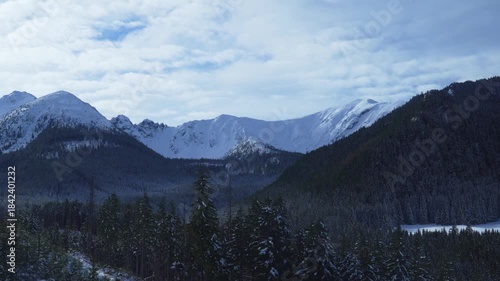 Rocks mountain peak snow winter coniferous forest Tatras Kaspravy up Poland