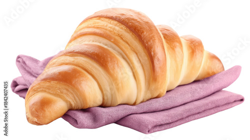 Freshly Baked Croissant on a Soft Purple Napkin in Bright Light