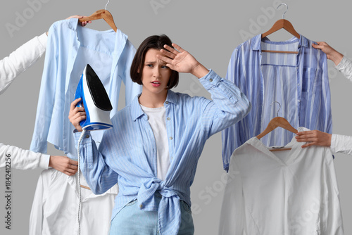 Tired young woman with iron...