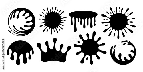 Seven black liquid splash and inkblot shapes white splashes inkblots