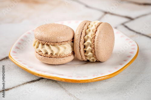 Obraz na płótnie Coffee Macaron With Cream Filling