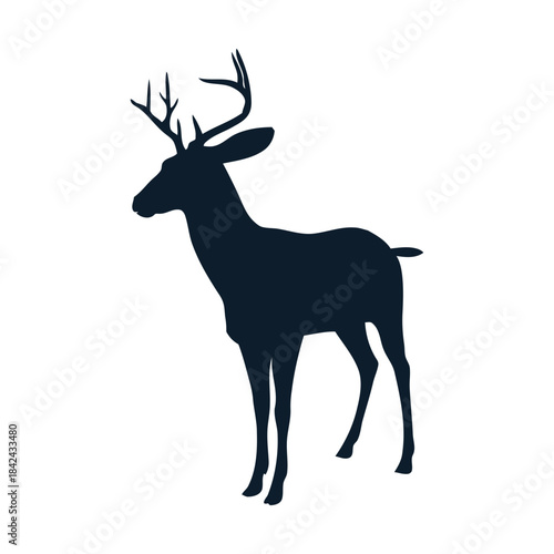 Silhouette of a majestic buck deer with impressive antlers standing alert, symbolizing nature's grace and wild beauty