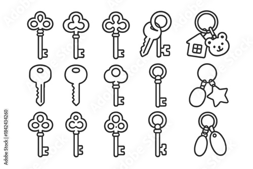 Set of antique and modern keys with various keychains and decorative fobs