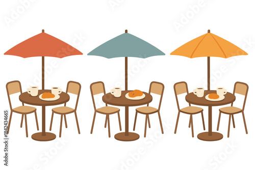 Three outdoor cafe tables with colorful umbrellas and breakfast settings
