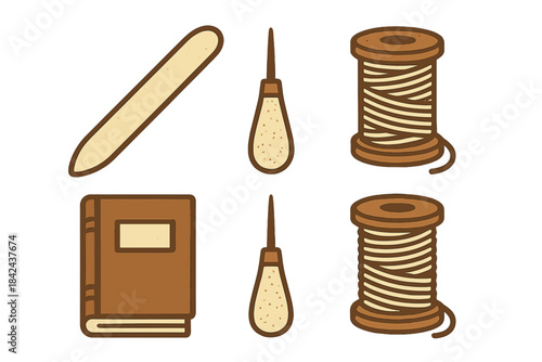 Crafting tools arranged on a flat surface for sewing and bookbinding activities in a creative workspace