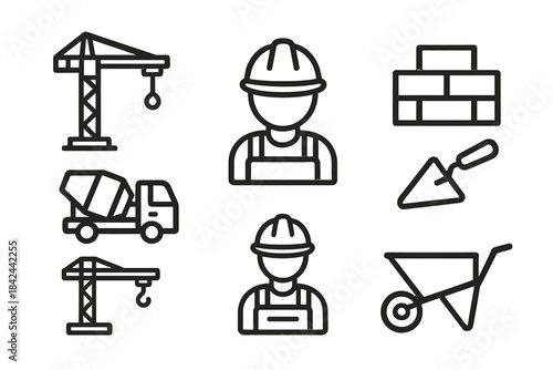 Construction tools and workers engage in building tasks at a construction site during the day