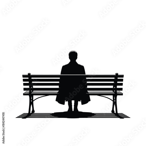 A solitary figure sits on a park bench bathed in bright backlight