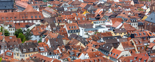 Billede på lærred Scenic aerial view patchwork of Heidelberg red rooftops tiled roofs historical colorful houses medieval old city German Baden-Wurttemberg