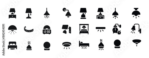 Set of black silhouette home lighting and furniture icons on whi