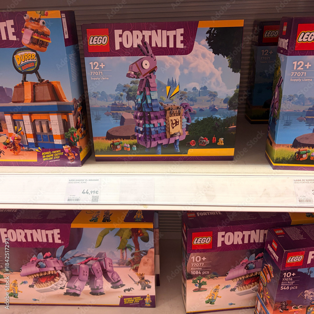 Obraz premium Alicante, Spain - December 11, 2025: LEGO Fortnite building sets displayed on store shelf, featuring vibrant packaging and iconic characters, perfect for gaming enthusiasts and collectors